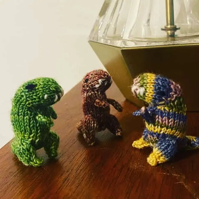 3 knitted dinos